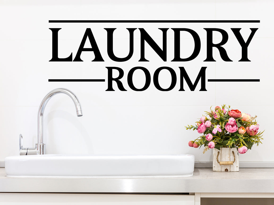 Decorative wall decal that says ‘Laundry Room’ on a laundry room wall.