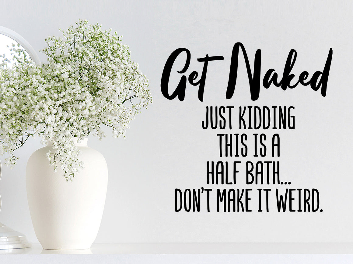 Wall decals for the bathroom that say ‘get naked just kidding this a half bath...don't make it weird on a bathroom wall.