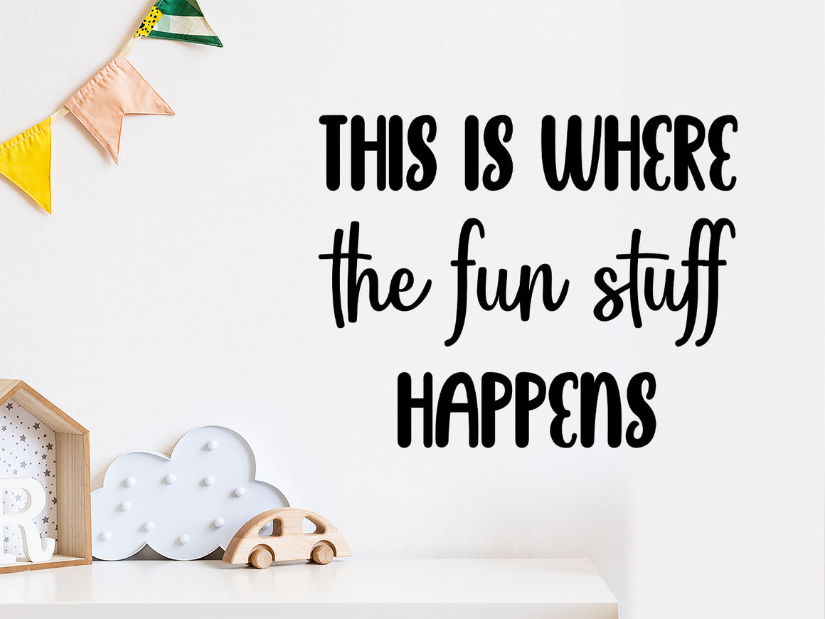 Wall decal for kids that says ‘this is where the fun stuff happens’ on a kid’s room wall. 