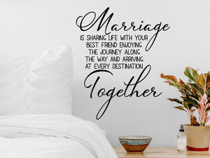 Wall decal for bedroom that says ‘Marriage is sharing life with your best friend enjoying the journey along the way and arriving at every destination together’ on a bedroom wall.