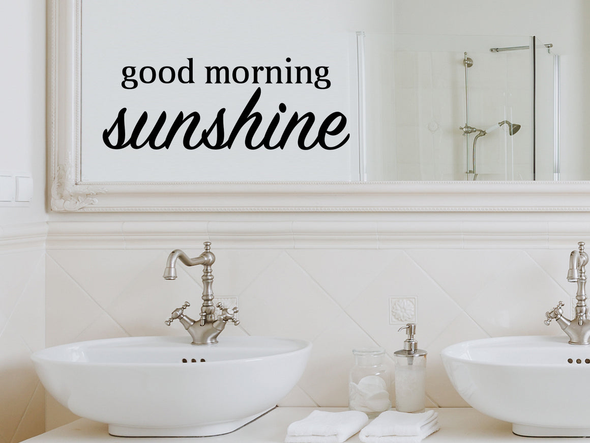 Wall decals for bathroom that say ‘Good Morning Sunshine’ in a bold font on a bathroom wall.