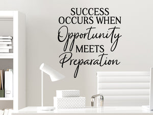 Wall decal for the office that says ‘Success Occurs When Opportunity Meets Preparation’ in a script font on an office wall.