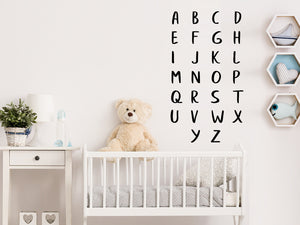 Wall decal for kids that has the alphabet arranged on a kid’s room wall.