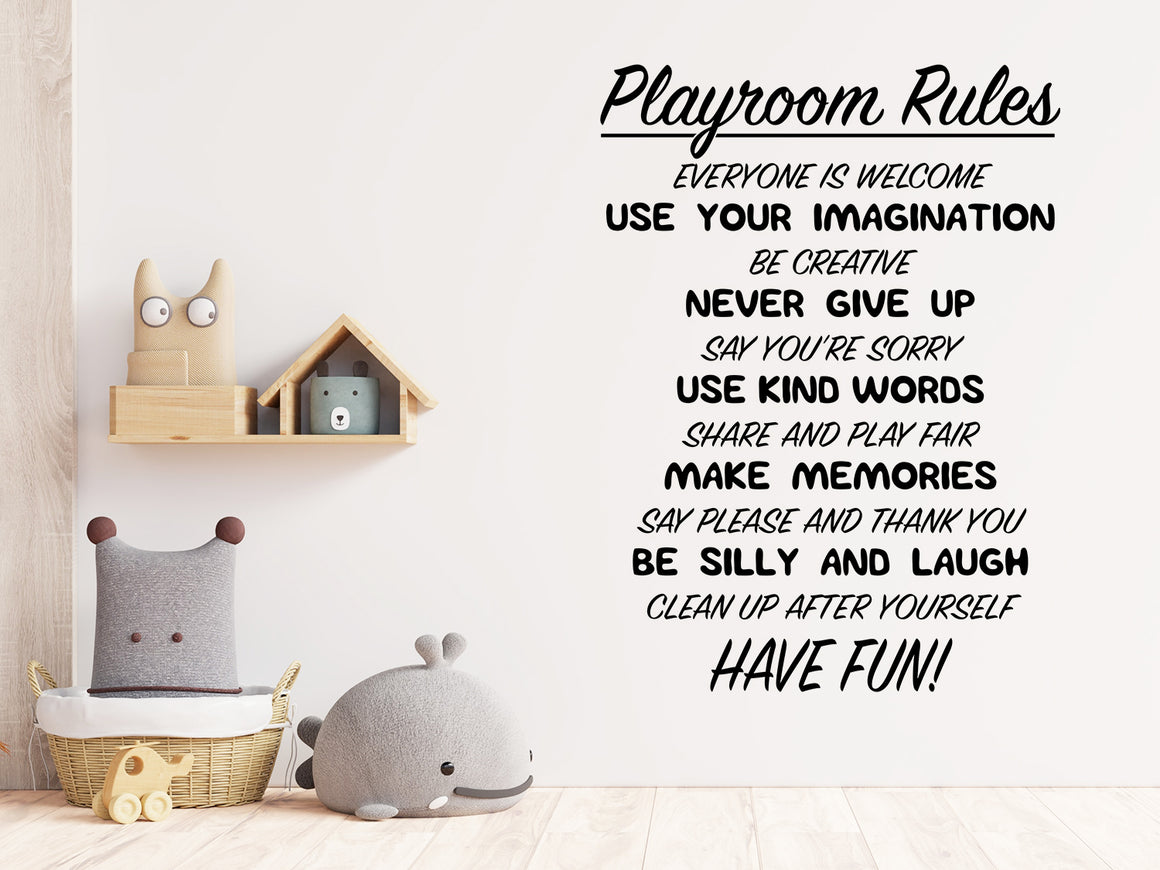 Living room wall decals that say ‘Playroom Rules’ in black on a living room wall. 