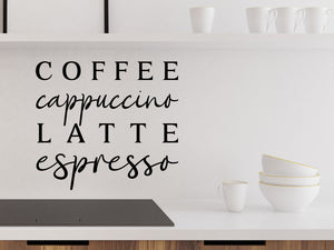 Wall decals for kitchen that say ‘Coffee Cappuccino Latte Espresso’ on a kitchen wall.