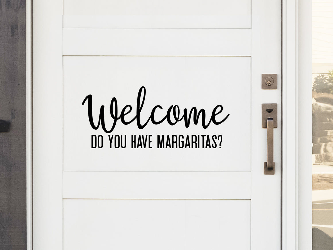 Front door decal that says, ‘Welcome Did You Bring Margaritas?’ on a front porch door. 