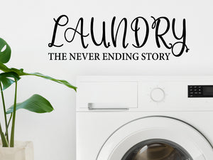 Laundry room wall decal that says ‘Laundry The Never Ending Story Script’ on a laundry room wall.
