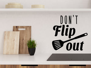 Wall decals for kitchen that say ‘Don't flip out’ on a kitchen wall.