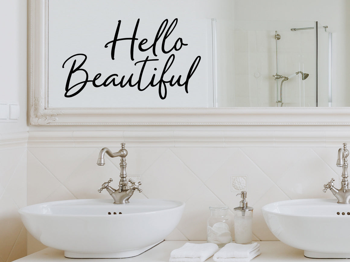 Wall decals for bathroom that say ‘Hello Beautiful’ in a script font on a bathroom wall.