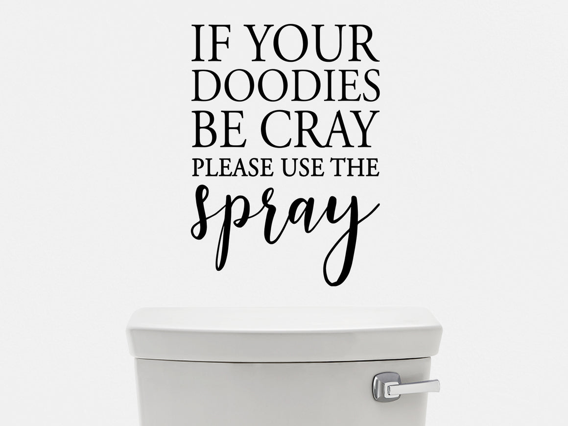 Wall decals for the bathroom that say 'If Your Doodies Be Cray Please Use The Spray' on a bathroom wall. 