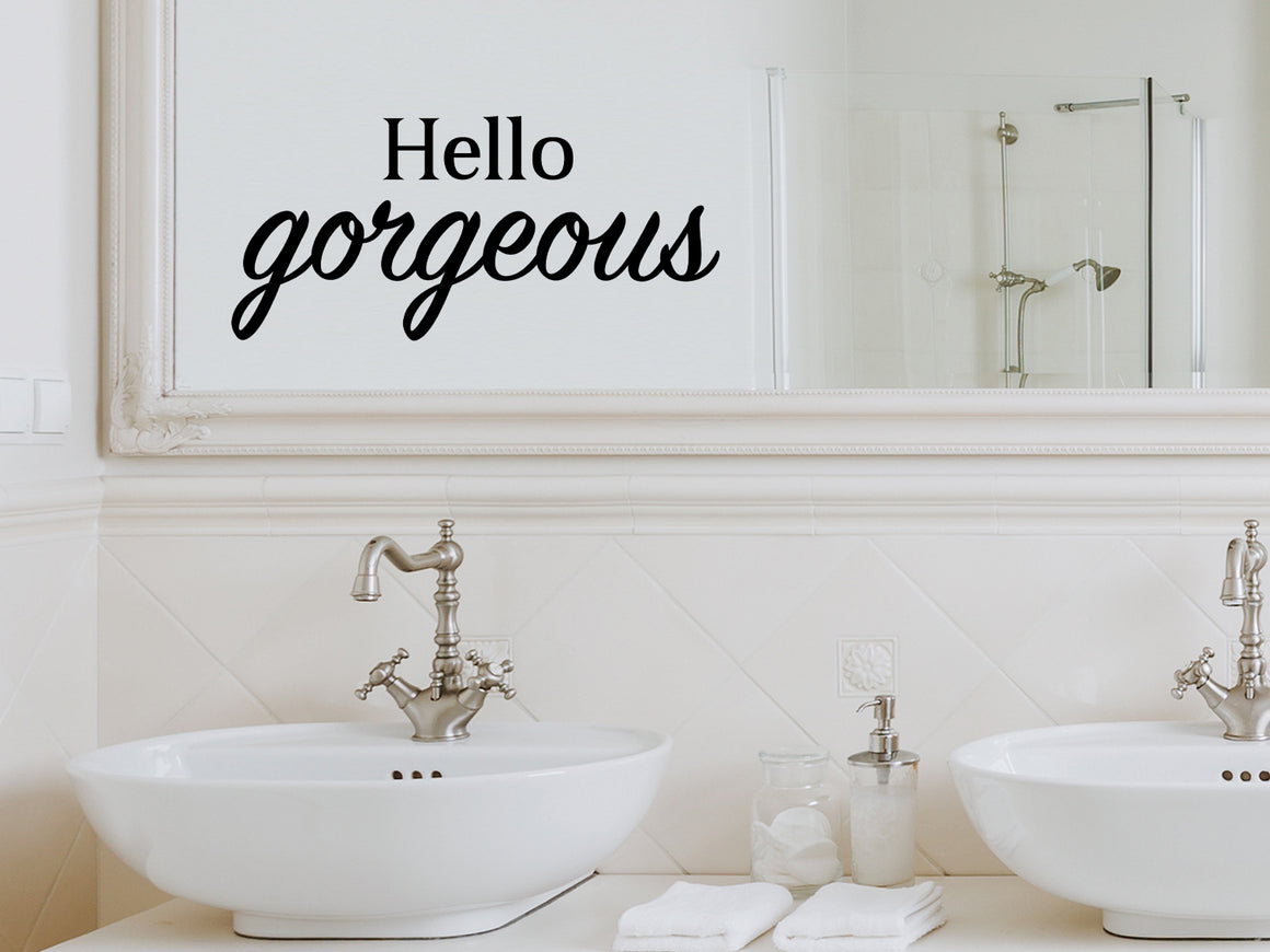 Wall decals for bathroom that say ‘Hello Gorgeous’ in a bold font on a bathroom wall.