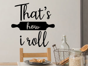 Decorative wall decal that says ‘That's How I Roll’ on a kitchen wall.