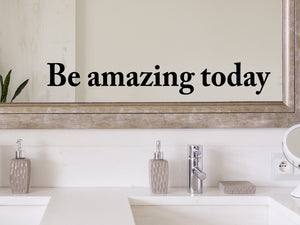 Wall decals for bathroom that say ‘Be Amazing Today’ in a print font on a bathroom wall.