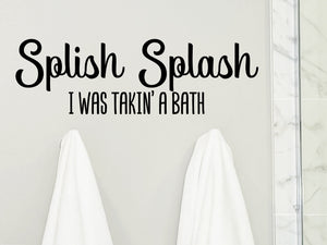 Wall decals for bathroom that say ‘splish splash I was takin' a bath’ on a bathroom wall.