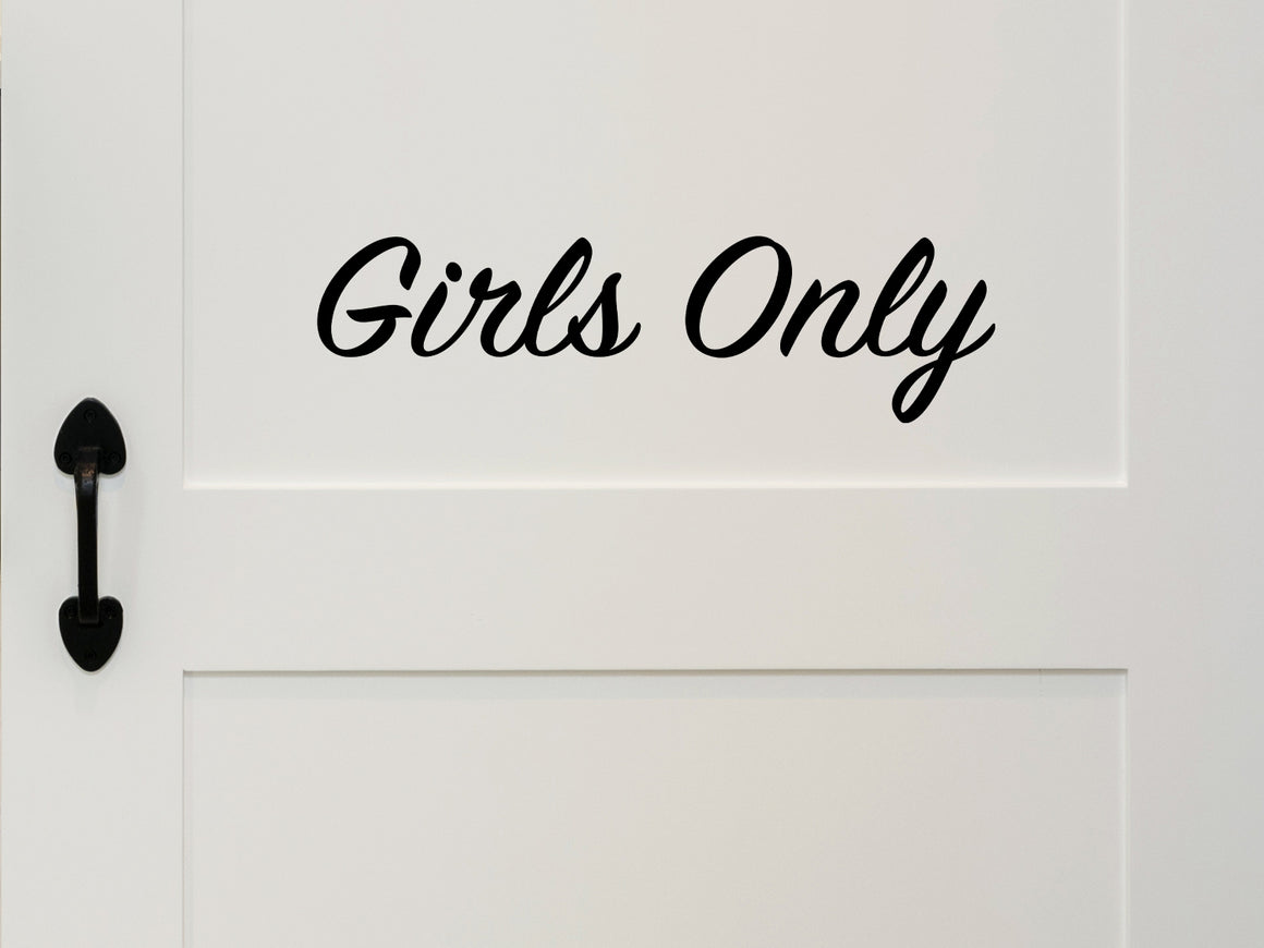 Wall decal for kids that says ‘Girls Only’ in a script font on a kid’s room wall. 