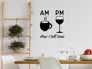 Wall decals for kitchen that say ‘AM Coffee PM Wine How I Tell Time’ on a kitchen wall.