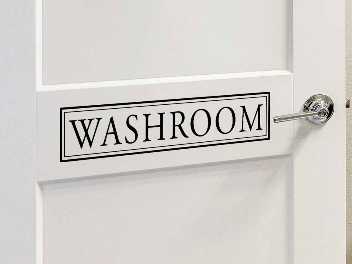 Wall decals for bathroom that say ‘washroom’ on a bathroom door.