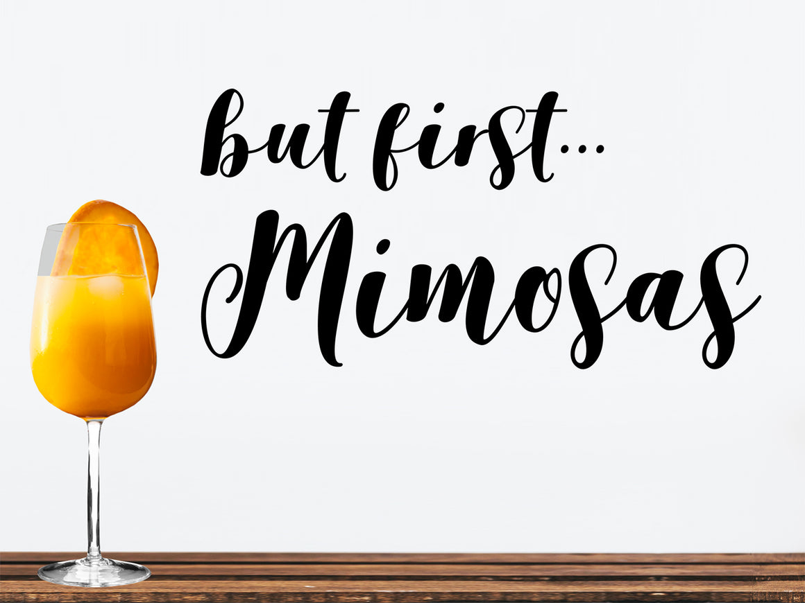 Wall decals for kitchen that say ‘but first mimosas’ on a kitchen wall.