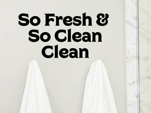 Wall decals for bathroom that say ‘so fresh and so clean clean’ on a bathroom wall.