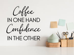 Wall decal for the office that says ‘Coffee In One Hand Confidence In The Other’ on an office wall.