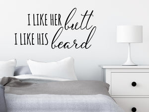 Wall decal for bedroom that says ‘I like her butt I like his beard’ on a bedroom wall.