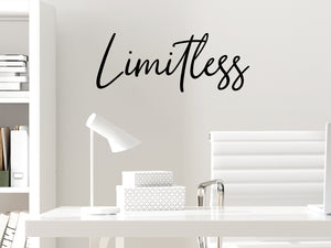 Wall decal for the office that says ‘Limitless’ in a cursive font on an office wall.