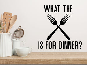 Wall decals for kitchen that say ‘What The Fork Is For Dinner’ in a bold font on a kitchen wall.