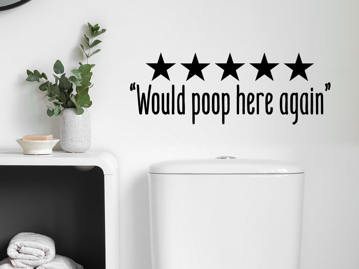 Wall decals for bathroom that say ‘Would Poop Here Again’ in a print font on a bathroom wall.