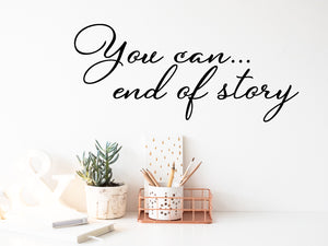 Wall decal for the office that says ‘You Can End Of Story’ in a cursive font on an office wall.