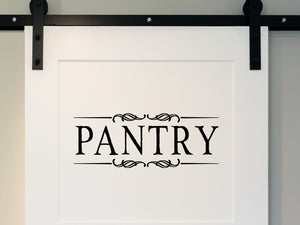 Wall decals for kitchen that say ‘Pantry’ with a ribbon design on a kitchen wall.