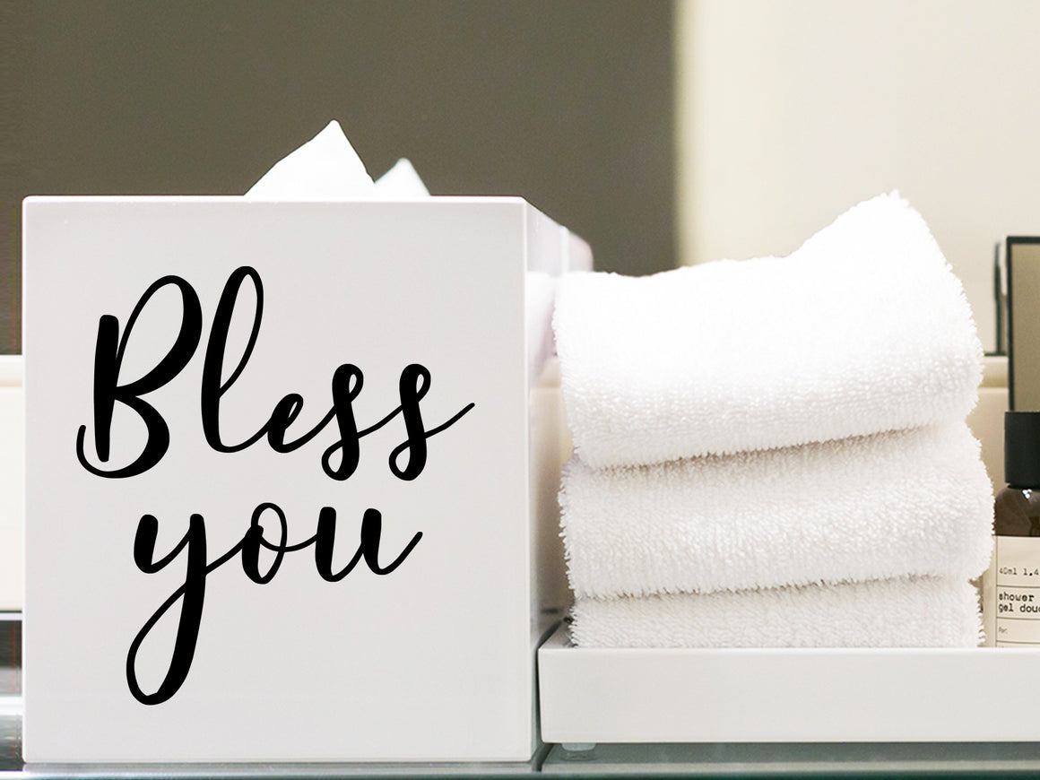 Vinyl decal for the bathroom that says ‘bless you’ on a tissue box.