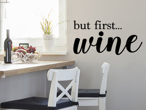 Wall decals for kitchen that say ‘but first....wine’ on a kitchen wall.